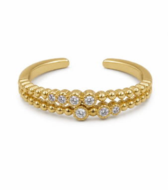 — A petite ring featuring sparkling stones for a graceful feminine touch.