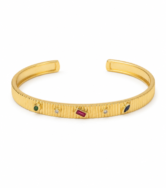 — A radiant gold-tone bracelet adorned with colorful stones for a vibrant luxury finish.