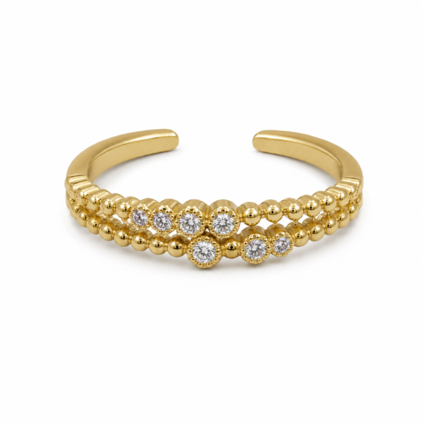 — A petite ring featuring sparkling stones for a graceful feminine touch.