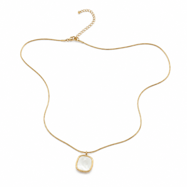 A delicate necklace featuring a playful square white detail for modern charm.