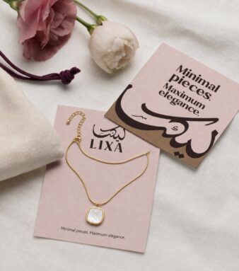 A delicate necklace featuring a playful square white detail for modern charm.