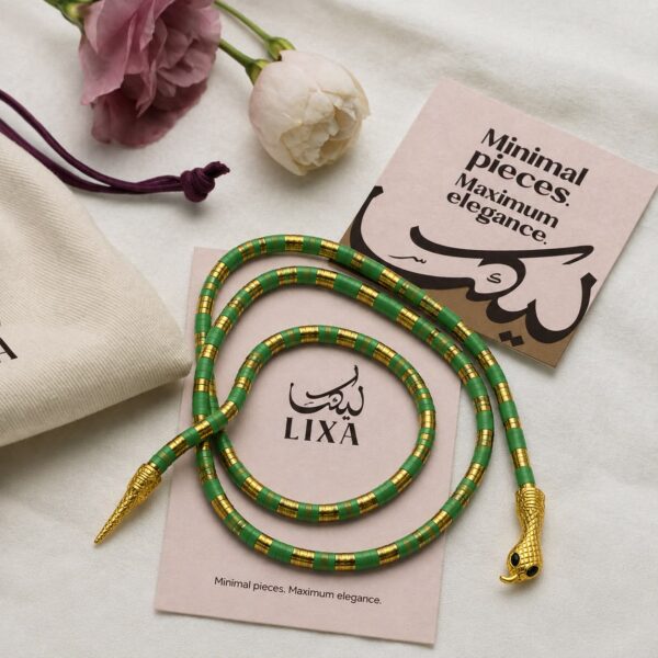 A bold snake-inspired choker finished in rich green for a striking statement.