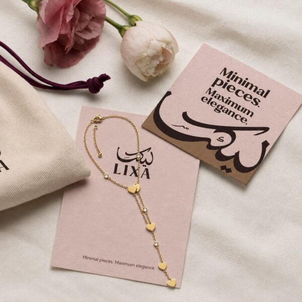 A refined chain decorated with petite sparkling hearts for a romantic touch.